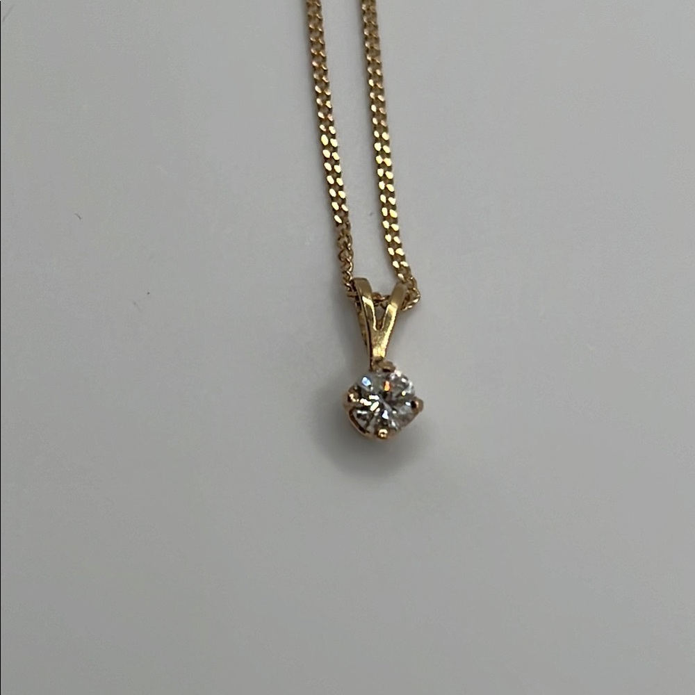 14kt gold necklace and .25 carat diamond